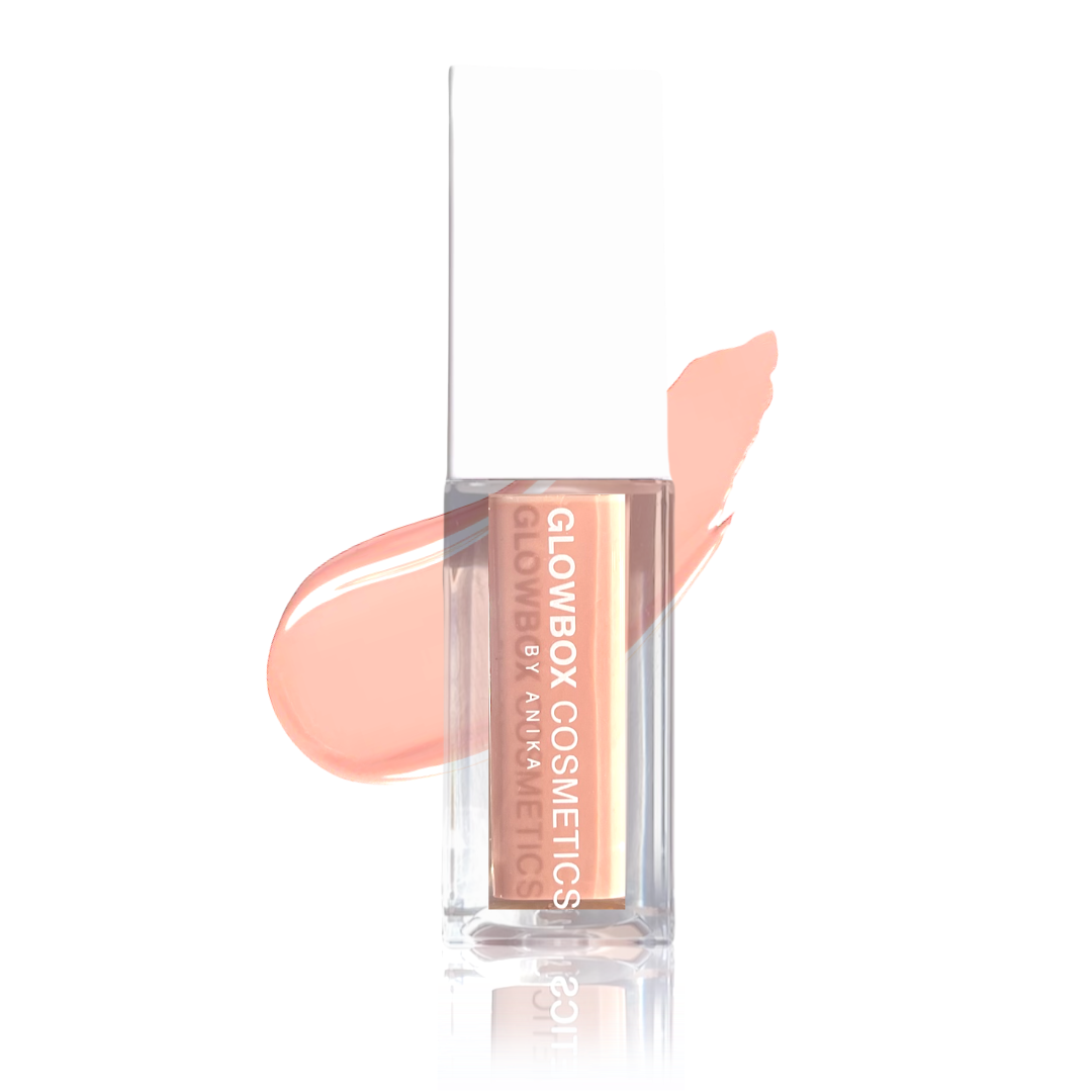 Our Maia lip gloss in a clear container with a white cap. The gloss is an almond brown tint with a thick consistency and is non-sticky. There is a swatch of the brown gloss shade to the back of the gloss tube. The gloss tube reflection is shown to the bot